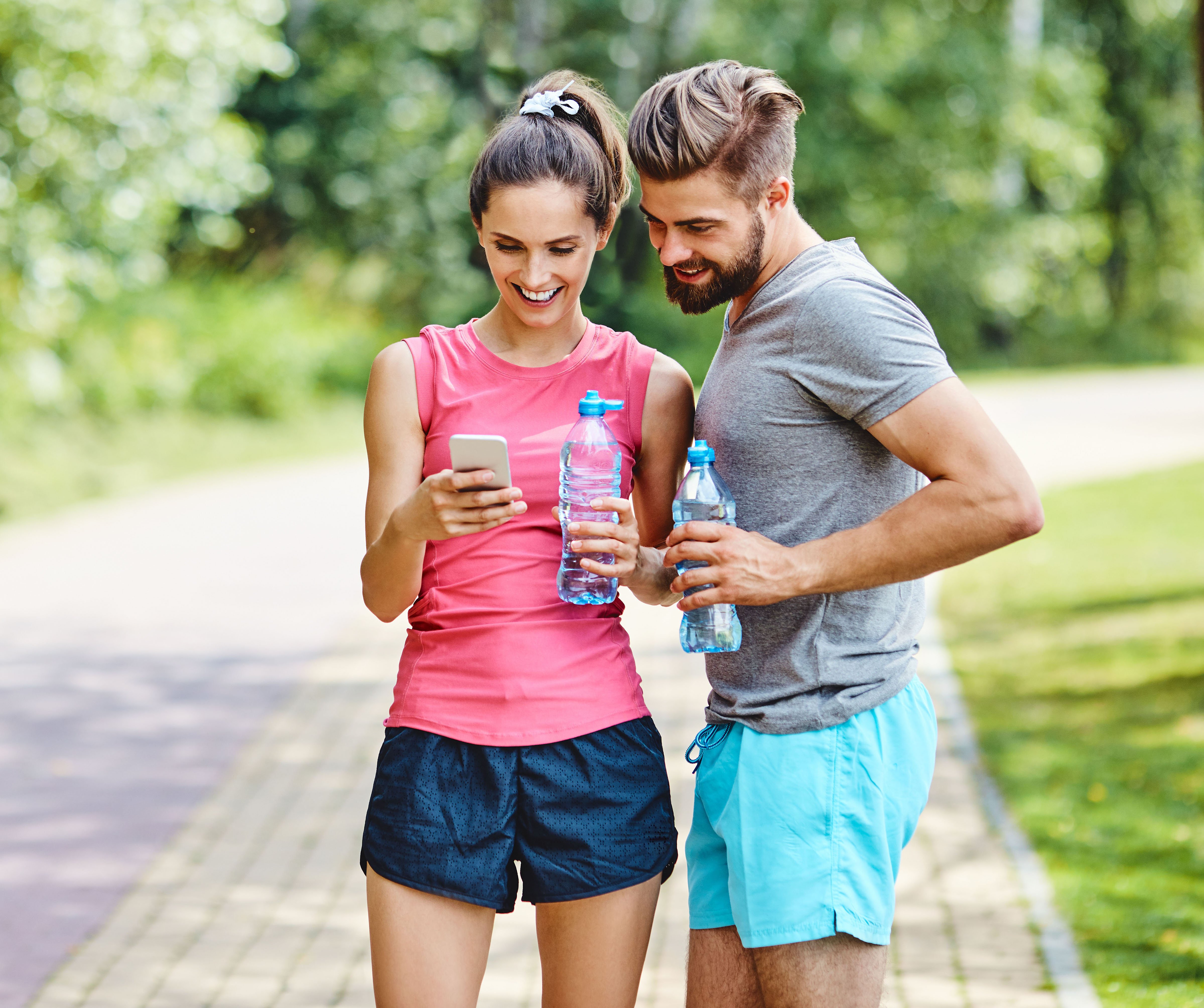 Man and woman using Health& to track health and fitness-1